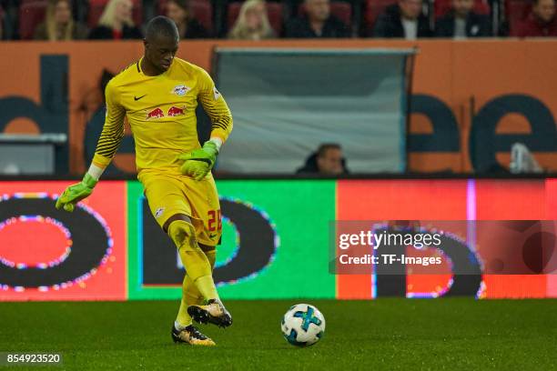 Yvon Mvogo of Leipzig controls the ball during the Bundesliga match between FC Augsburg and RB Leipzig at WWK-Arena on September 19, 2017 in...