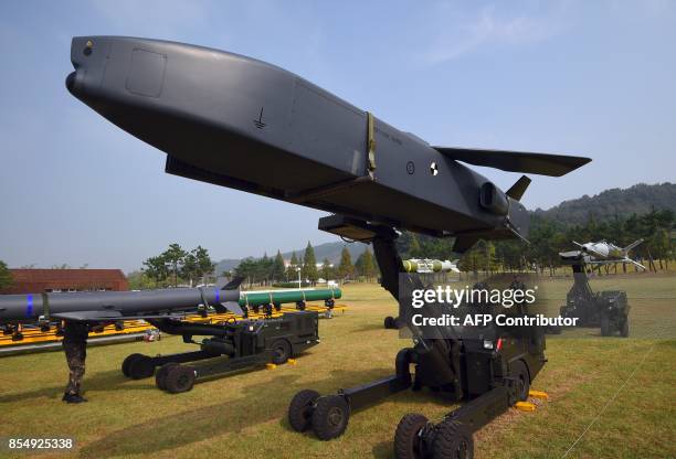 This picture taken on September 25, 2017 shows a Taurus long-range air-to-surface missile during a media day presentation of a commemoration event...