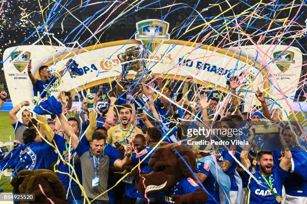 Players of Cruzeiro celebrate the title with the trophy after a match between Cruzeiro and Flamengo as part of Copa do Brasil Final 2017 at Mineirao...