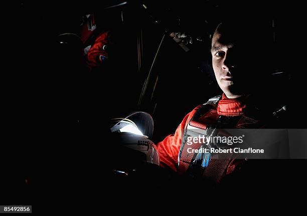 Lee Holdsworth driver of the Garry Rogers Motorsport Holden poses for a portrait in the pit garages in preperation for the Clipsal 500, round one of...