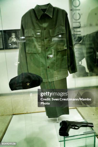 Beret, uniform and pistol used by Ernesto "Che" Guevara is seen in the Che Guevara museum, on September 21 in Santa Clara, Cuba. Guevera was killed...