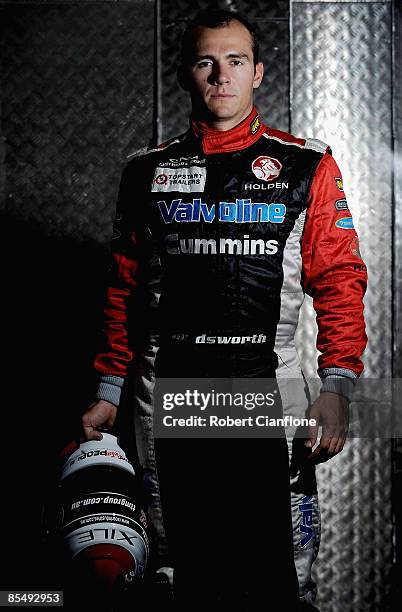 Lee Holdsworth driver of the Garry Rogers Motorsport Holden poses for a portrait in the pit garages in preperation for the Clipsal 500, round one of...