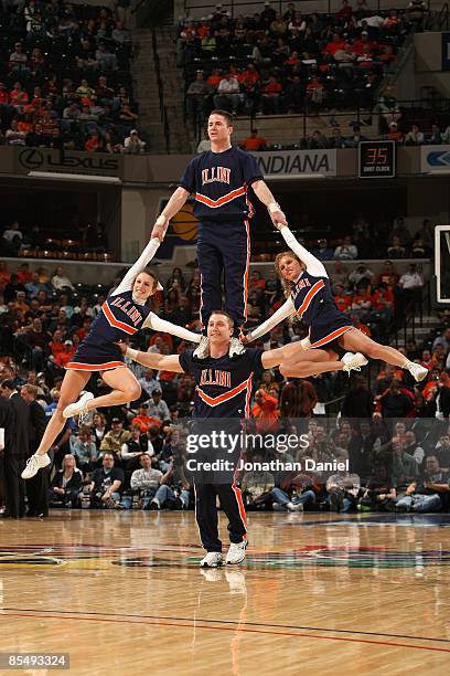 Cheerleaders form the Illinois Fighting Illini perform against the Purdue Boilermakers during their semifinal game of the Big Ten Men's Basketball...