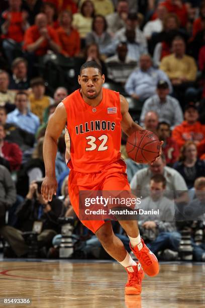 Demetri McCamey of the Illinois Fighting Illini brings the ball up court against the Purdue Boilermakers during their semifinal game of the Big Ten...