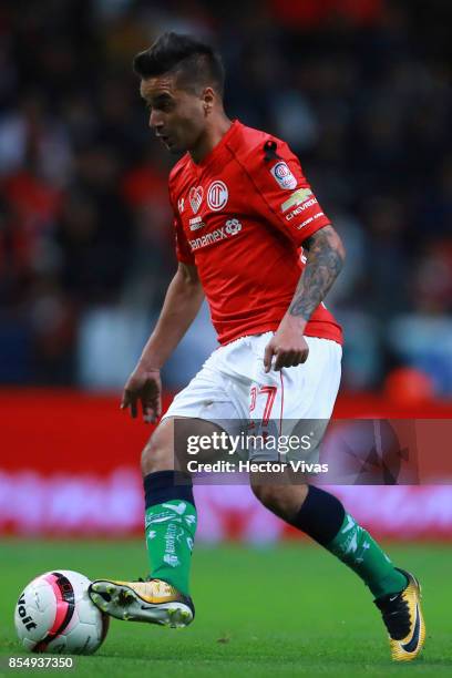 Rodrigo Gomez of Toluca drives the ball during the 11th round match between Toluca and Pumas UNAM as part of the Torneo Apertura 2017 Liga MX at...