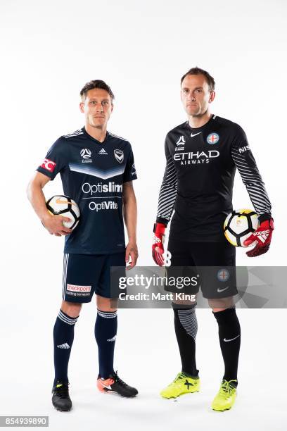 Mark Milligan of the Melbourne Victory and Eugene Galekovic of Melbourne City FC pose during the A-League Media Day on September 26, 2017 in Sydney,...