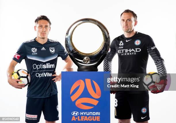 Mark Milligan of the Melbourne Victory and Eugene Galekovic of Melbourne City FC pose during the A-League Media Day on September 26, 2017 in Sydney,...