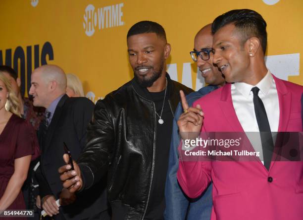 Executive Producers Jamie Foxx and Tim Story and actor Utkarsh Ambudkar take a selfie at the premiere of Showtime's "White Famous" at The Jeremy...