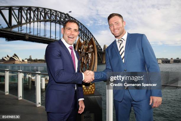 Melbourne Storm captain Cameron Smith and North Queensland Cowboys captain Gavin Cooper pose with the Provan Summons trophy during the NRL Grand...