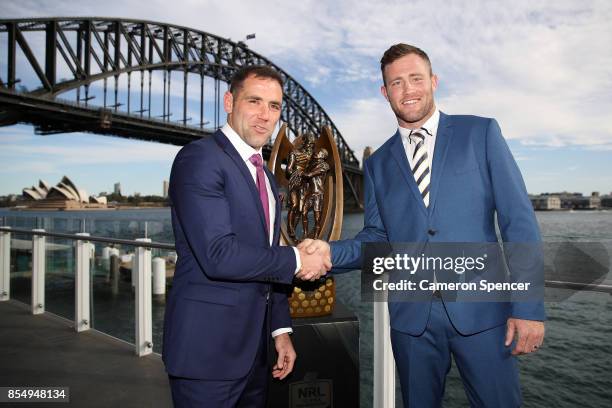 Melbourne Storm captain Cameron Smith and North Queensland Cowboys captain Gavin Cooper pose with the Provan Summons trophy during the NRL Grand...