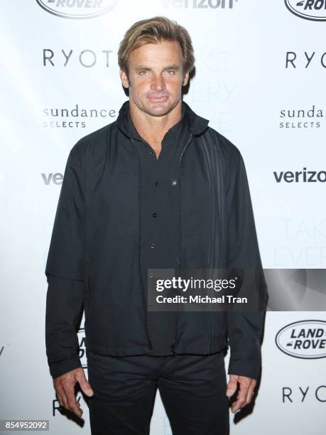 Laird Hamilton arrives at the Los Angeles premiere of Sundance Selects' "Take Every Wave: The Life of Laird Hamilton" held at ArcLight Hollywood on...