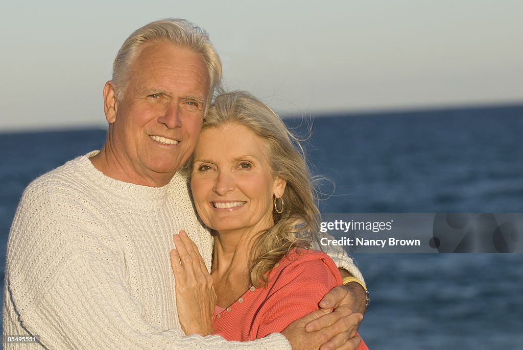 Senior Caucasian Couple headshots on the beach