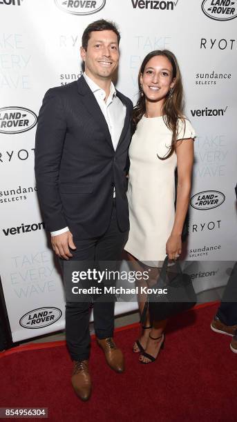 World Surf League's Tim Greenberg and Cristina Rodriguez attend the Los Angeles premiere of 'Take Every Wave: The Life of Laird Hamilton,' sponsored...