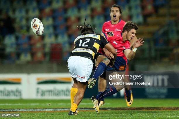 Alex Nankivell of Tasman is tackled by Johnny Fa'auli of Taranaki during the round seven Mitre 10 Cup match between Taranaki and Tasman at Yarrow...