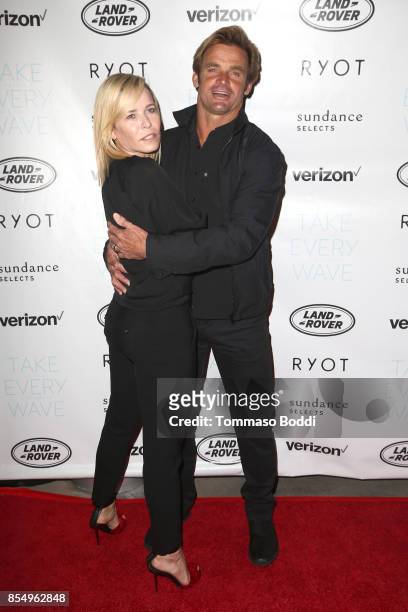 Chelsea Handler and Laird Hamilton attend the Premiere of Sundance Selects' "Take Every Wave: The Life Of Laird Hamilton" at ArcLight Hollywood on...