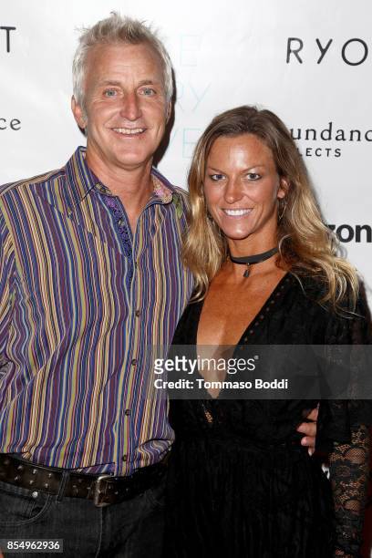 Jed Pearson IV and Staci Minnick attend the Premiere of Sundance Selects' "Take Every Wave: The Life Of Laird Hamilton" at ArcLight Hollywood on...