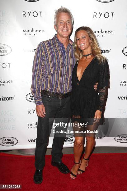 Jed Pearson IV and Staci Minnick attend the Premiere of Sundance Selects' "Take Every Wave: The Life Of Laird Hamilton" at ArcLight Hollywood on...