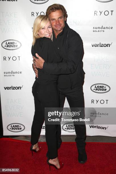 Chelsea Handler and Laird Hamilton attend the Premiere of Sundance Selects' "Take Every Wave: The Life Of Laird Hamilton" at ArcLight Hollywood on...