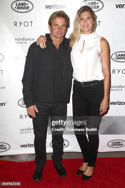 Laird Hamilton and Gabrielle Reece attend the Premiere of Sundance Selects' "Take Every Wave: The Life Of Laird Hamilton" at ArcLight Hollywood on...