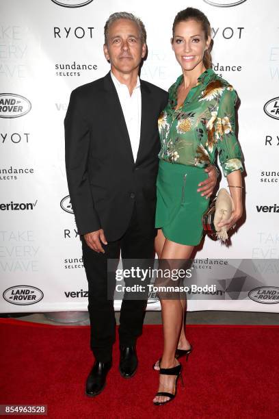 Jonathan S. Marshall and Tricia Helfer attend the Premiere of Sundance Selects' "Take Every Wave: The Life Of Laird Hamilton" at ArcLight Hollywood...