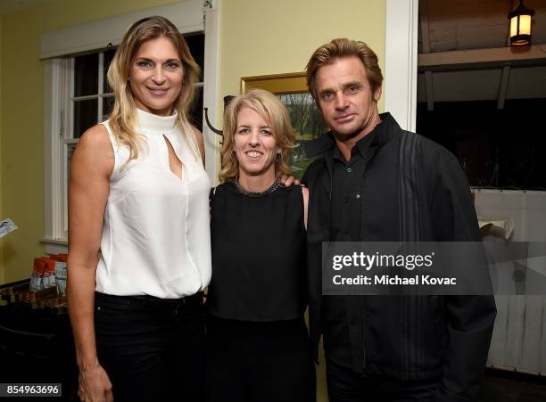 Gabrielle Reece, director Rory Kennedy, and Laird Hamilton attend the Los Angeles premiere of 'Take Every Wave: The Life of Laird Hamilton,'...
