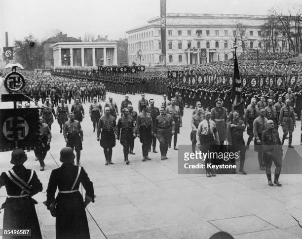 Nazi dictator Adolf Hitler and military leader Hermann Goering lead a procession of Nazis to the Memorial Hall in Munich, to celebrate the...