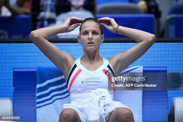 Karolina Pliskova of Czech Repubic takes a rest during the women's singles quarter-final match against Ashleigh Barty of Australia at the WTA Wuhan...