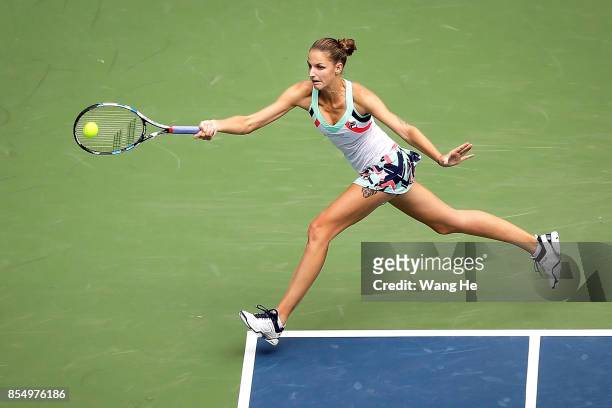 Karolina Pliskova of Czech returns a shot during the match against Ashleigh Barty of Australia on Day 5 of 2017 Dongfeng Motor Wuhan Open at Optics...