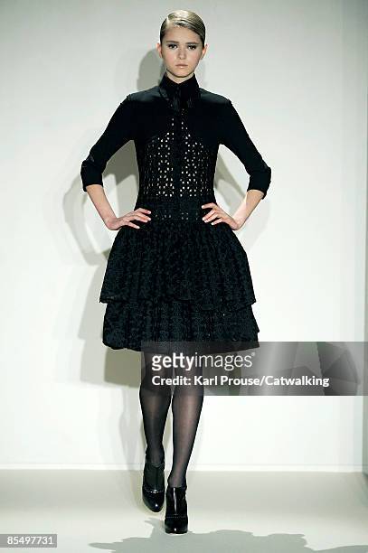 Model walks the runway at the Collette Dinnigan Ready-to-Wear A/W 2009 fashion show during Paris Fashion Week at Hotel Saint-James & Albany on March...
