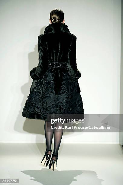 Model walks the runway at the Collette Dinnigan Ready-to-Wear A/W 2009 fashion show during Paris Fashion Week at Hotel Saint-James & Albany on March...