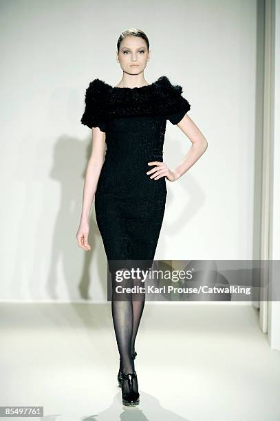 Model walks the runway at the Collette Dinnigan Ready-to-Wear A/W 2009 fashion show during Paris Fashion Week at Hotel Saint-James & Albany on March...