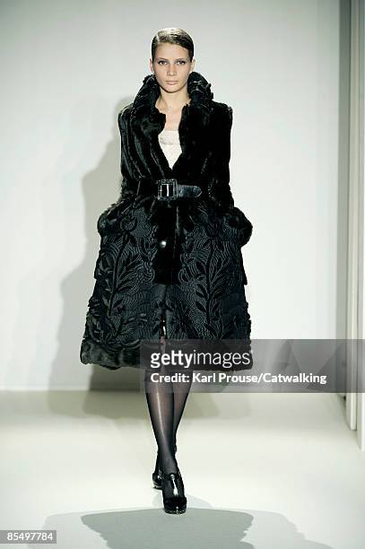 Model walks the runway at the Collette Dinnigan Ready-to-Wear A/W 2009 fashion show during Paris Fashion Week at Hotel Saint-James & Albany on March...