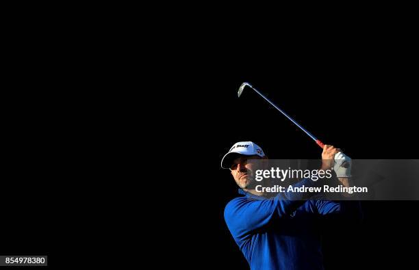 Paul Waring of England hits his second shot on the 14th hole during day one of the British Masters at Close House Golf Club on September 28, 2017 in...