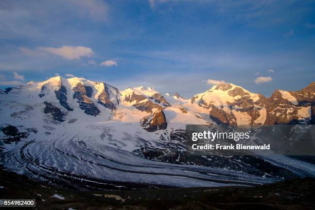 Aerial view on the snow covered mountains Piz Palü, Piz Bernina and Piz Morteratsch from Diavolezza.