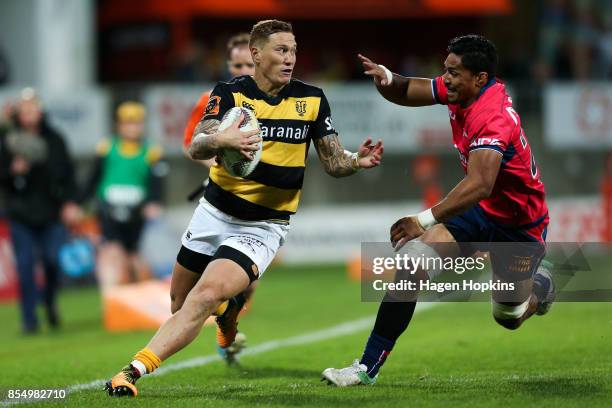 Declan O'Donnell of Taranaki looks to evade Peter Samu of Tasman during the round seven Mitre 10 Cup match between Taranaki and Tasman at Yarrow...