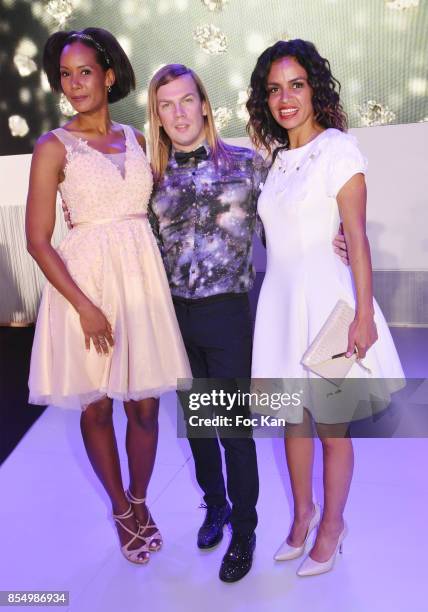 Miss france 2003 Corinne Coman, Christophe Guillarme and TV presenter Laurence Roustandjee attend the Christophe Guillarme Show as part of the Paris...