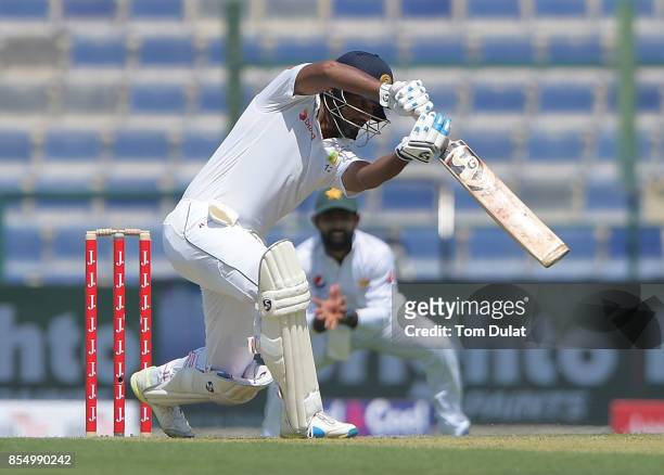 Dimuth Karunaratne of Sri Lanka bats during Day One of the First Test between Pakistan and Sri Lanka at Sheikh Zayed Stadium on September 28, 2017 in...