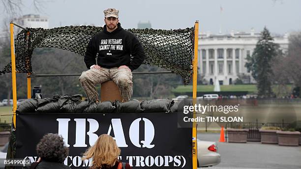 Adam Kokesh, a Board Member of Iraq Veterans Against the War, who served in Fallujah with a Marine Corps Civil Affairs team participates in...