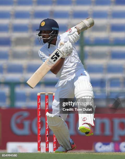 Dinesh Chandimal of Sri Lanka bats during Day One of the First Test between Pakistan and Sri Lanka at Sheikh Zayed Stadium on September 28, 2017 in...