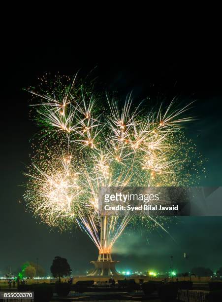 fireworks at minar-e-pakistan - minar e pakistan stock pictures, royalty-free photos & images