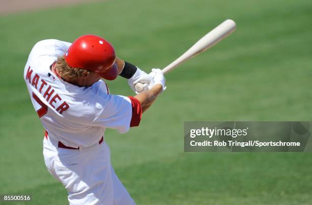 Joe Mather of the St. Louis Cardinals bats against the Washington Nationals during a spring training game at Roger Dean Stadium on February 28, 2009...