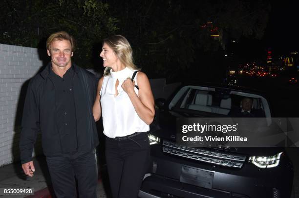 Laird Hamilton and Gabrielle Reece attend The Los Angeles Premiere of Take Every Wave: The Life Of Laird Hamilton, Sponsored By Land Rover, Verizon...