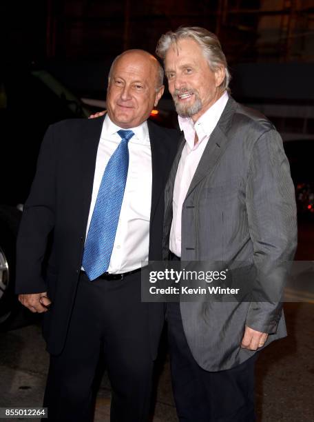 Executive producers Laurence Mark and Michael Douglas arrive at the premiere of Columbia Pictures' "Flatliners" at the Ace Theatre on September 27,...