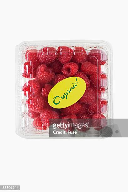 carton of organic raspberries - punnet stock pictures, royalty-free photos & images