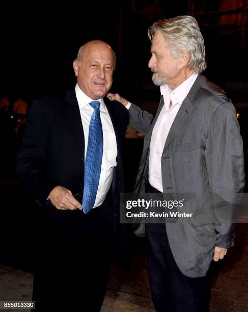 Executive producers Laurence Mark and Michael Douglas arrive at the premiere of Columbia Pictures' "Flatliners" at the Ace Theatre on September 27,...