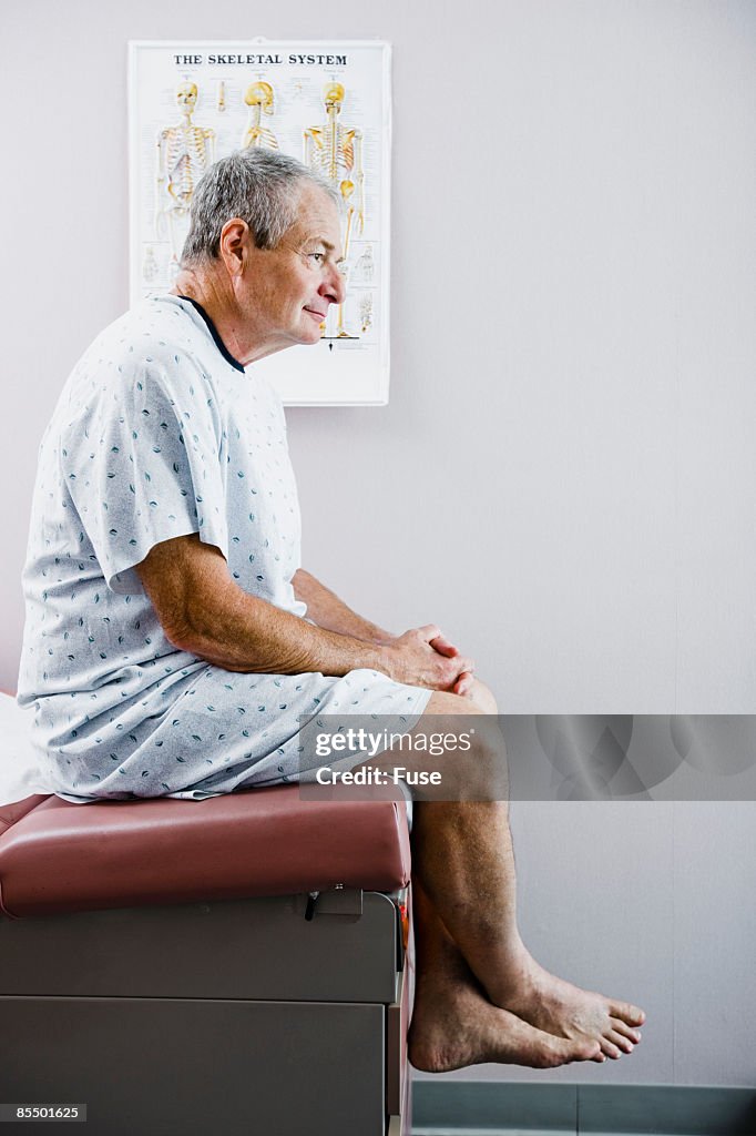 Man Wearing Hospital Gown