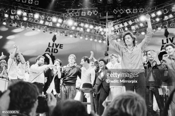 Live Aid dual venue benefit concert held on 13th July 1985 at Wembley Stadium in London, England, the concerts were organised as a follow up to the...