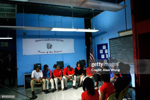 First lady Michelle Obama speaks to students during her visit to Anacostia High School March 19, 2009 in Washington, DC. The first lady had a...