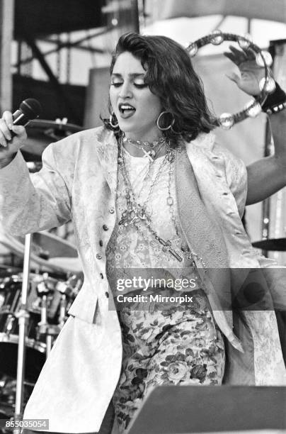 Live Aid dual venue benefit concert held on 13th July 1985 at Wembley Stadium in London, England, the concerts were organised as a follow up to the...