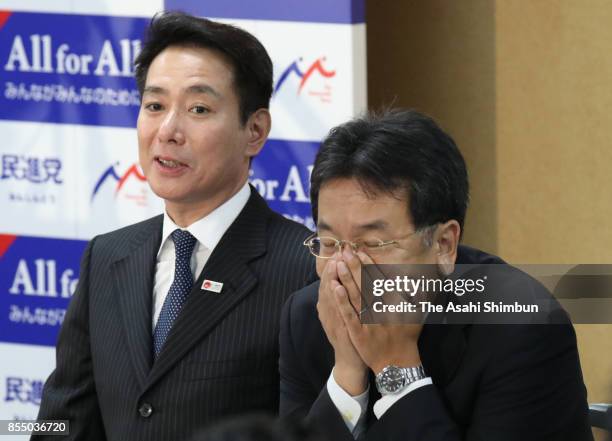 Opposition Democratic Party President Seiji Maehara and Deputy President Yukio Edano attend the party's lawmakers meeting at the party headquarters...